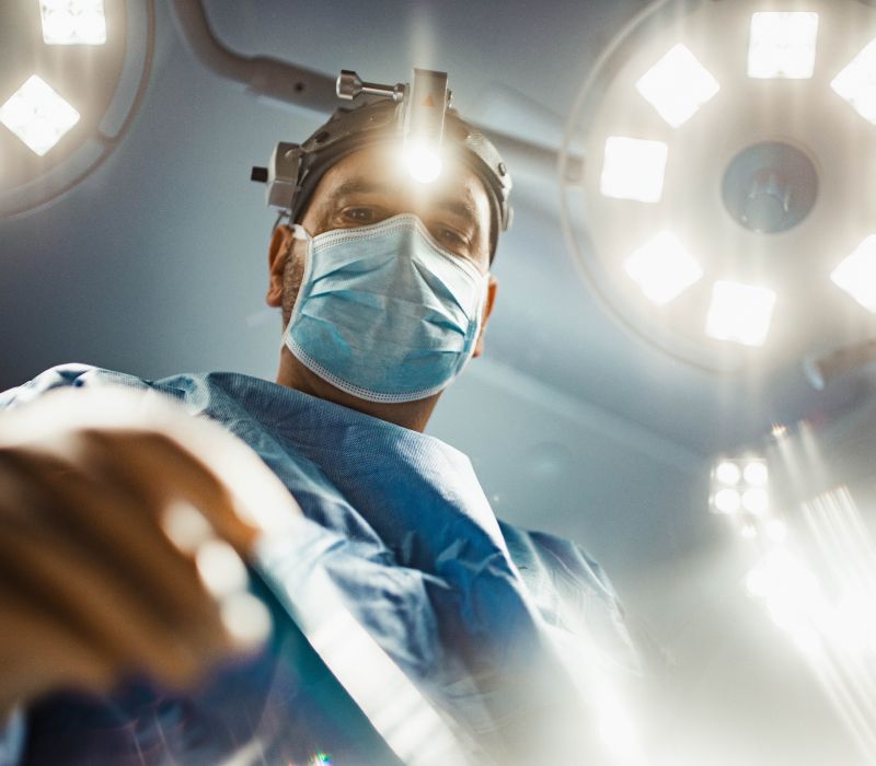 Surgeon preparing for an operation in surgery.